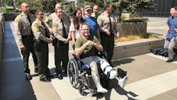 Los Angeles Sheriff's Deputy Garrett Rifkin lost part of his leg after he was involved in a wreck with a driver who sped off while on his way to work on Aug. 3. Los Angeles Sheriff's Deputy Garrett Rifkin lost part of his leg after he was involved in a wreck with a driver who sped off while on his way to work on Aug. 3.