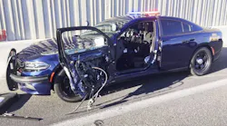 The Nevada Highway Patrol says this car was pulled over Monday, Aug. 6, 2018, on a traffic stop when a passing car hit the door as a trooper was getting out.