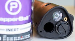 The 350 lm flashlight is right next to the laser emitter, barrel, and CO2 cartridge chamber. The beam of the flashlight is concentric enough to actually guide the PepperBalls. The flashlight is bright enough for general use, although it has a fairly narrow beam and soft spillbeam.