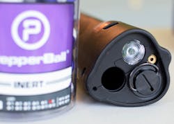 The 350 lm flashlight is right next to the laser emitter, barrel, and CO2 cartridge chamber. The beam of the flashlight is concentric enough to actually guide the PepperBalls. The flashlight is bright enough for general use, although it has a fairly narrow beam and soft spillbeam. The 350 lm flashlight is right next to the laser emitter, barrel, and CO2 cartridge chamber. The beam of the flashlight is concentric enough to actually guide the PepperBalls. The flashlight is bright enough for general use, although it has a fairly narrow beam and soft spillbeam.