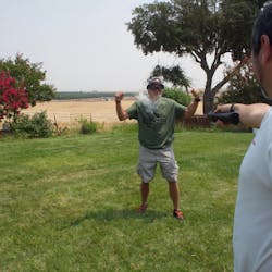 Lindsey had to see how this product worked firsthand. We fired some initial rounds in a slight breeze. Unlike liquid dispersal products, it doesn't take a moment for the product to vaporize. That is, it is effective immediately. We were able to make a couple of conclusions from this testing. First, the impact of the projectile was enough to get someone's attention. Second, the PAVA delivery system really does give a margin for accuracy area. This could have been fired at Lindsey's feet and it would have worked. Lindsey had to see how this product worked firsthand. We fired some initial rounds in a slight breeze. Unlike liquid dispersal products, it doesn't take a moment for the product to vaporize. That is, it is effective immediately. We were able to make a couple of conclusions from this testing. First, the impact of the projectile was enough to get someone's attention. Second, the PAVA delivery system really does give a margin for accuracy area. This could have been fired at Lindsey's feet and it would have worked.