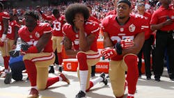 From left, The San Francisco 49ers' Eli Harold (58), Colin Kaepernick (7) and Eric Reid (35) kneel during the national anthem before their a game against the Dallas Cowboys on October 2, 2016, at Levi's Stadium in Santa Clara, Calif. From left, The San Francisco 49ers' Eli Harold (58), Colin Kaepernick (7) and Eric Reid (35) kneel during the national anthem before their a game against the Dallas Cowboys on October 2, 2016, at Levi's Stadium in Santa Clara, Calif.