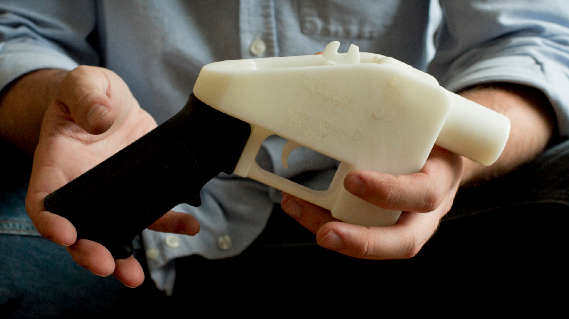 Cody Wilson with the first completely 3D-printed handgun, The Liberator, at his home in Austin, Texas on Friday May 10, 2013.