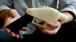 Cody Wilson with the first completely 3D-printed handgun, The Liberator, at his home in Austin, Texas on Friday May 10, 2013. Cody Wilson with the first completely 3D-printed handgun, The Liberator, at his home in Austin, Texas on Friday May 10, 2013.