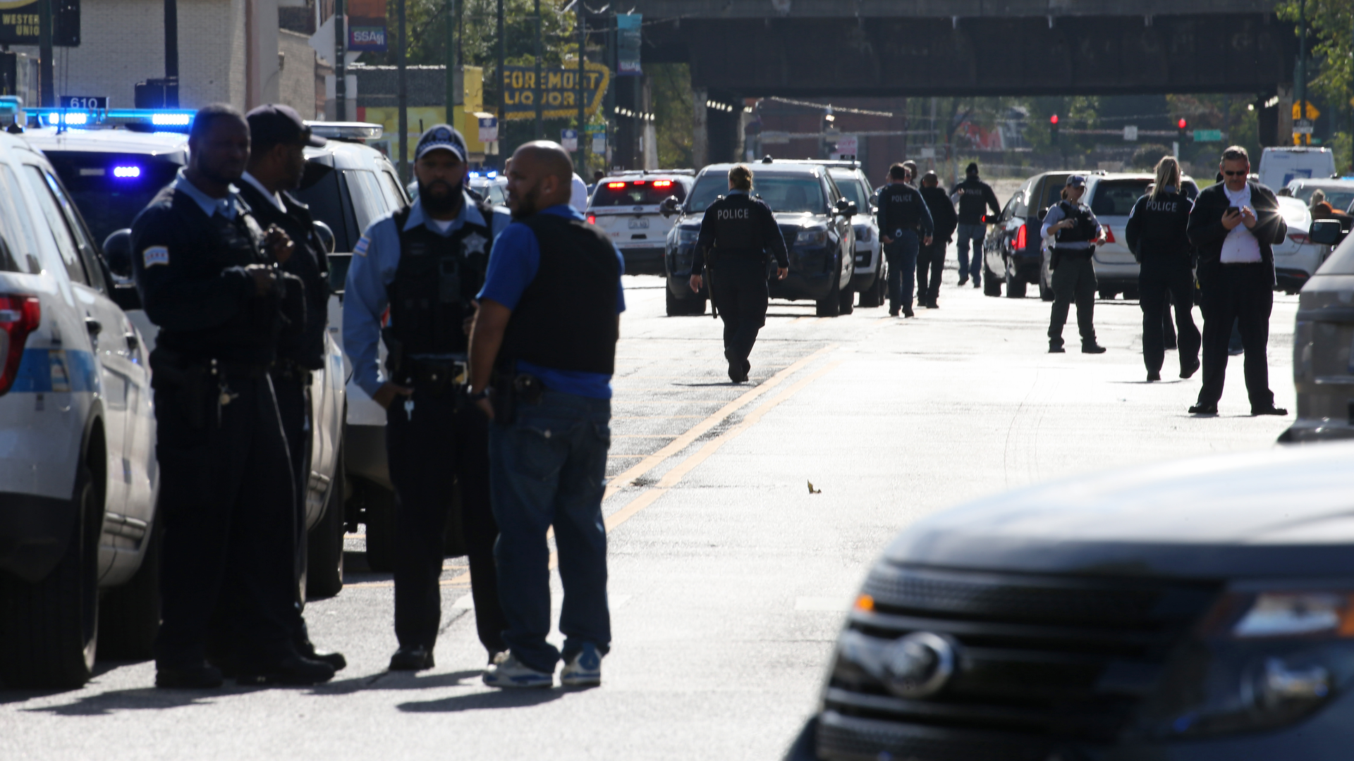 Police investigate the scene where six people were shot after a funeral service in the Burnside neighborhood on the South Side of Chicago on Monday afternoon, Oct. 22, 2018. The shooting took place in the 9200 block of South Cottage Grove Avenue. (Antonio Perez/Chicago Tribune/TNS)