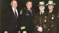 LtCol. Ted Evans (ret), Sheriff Mike Evans, Trooper Charlie Evans and TFC Eric Evans. Photo circa 2007. LtCol. Ted Evans (ret), Sheriff Mike Evans, Trooper Charlie Evans and TFC Eric Evans. Photo circa 2007.
