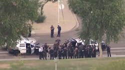 Two Tempe police officers were wounded in an exchange of gunfire with a suspect Monday afternoon. Two Tempe police officers were wounded in an exchange of gunfire with a suspect Monday afternoon.