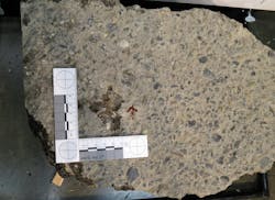 High angle impact of 45 auto on asphalt. High angle impact of 45 auto on asphalt.