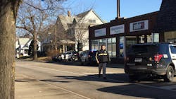 A Lafayette police officer was shot in the back by a colleague after a dog charged at the officers during an investigation Tuesday morning. A Lafayette police officer was shot in the back by a colleague after a dog charged at the officers during an investigation Tuesday morning.