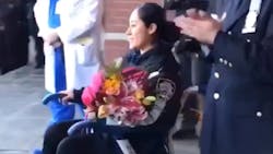NYPD Officer Vanessa Rodriguez, who was injured as the carjacking and robbery suspects attempted to make a getaway Sunday, left Jacobi Medical Center as officers lined the sidewalk and bagpipe music played.
