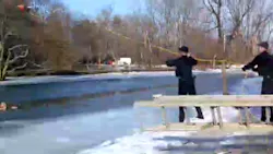 Trenton police officers saved the life of a man who fell through a frozen canal over the weekend. Trenton police officers saved the life of a man who fell through a frozen canal over the weekend.