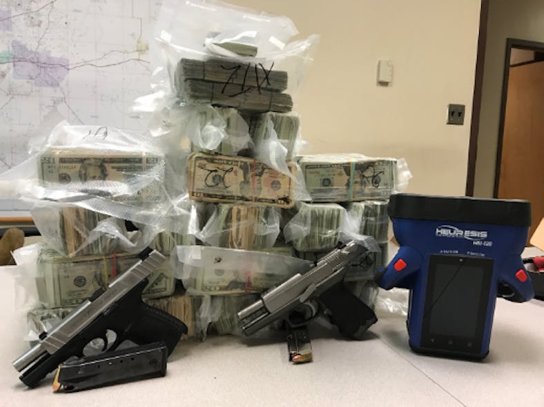 Cash and firearms seized using Viken Detection technology.
