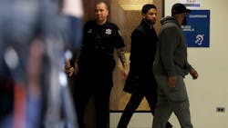 Actor Jussie Smollett exits courtroom 101 into the hallway at the Leighton Criminal Court Building following an emergency hearing over his disorderly conduct charges on Tuesday, March 26, 2019.