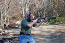 Frank Borelli firing the Remington 870. Frank Borelli firing the Remington 870.