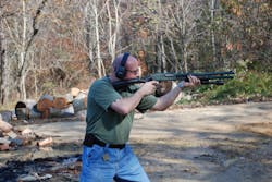 Frank Borelli firing the Remington 870. Frank Borelli firing the Remington 870.