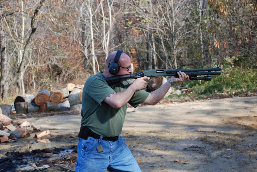 Frank Borelli firing the Remington 870.
