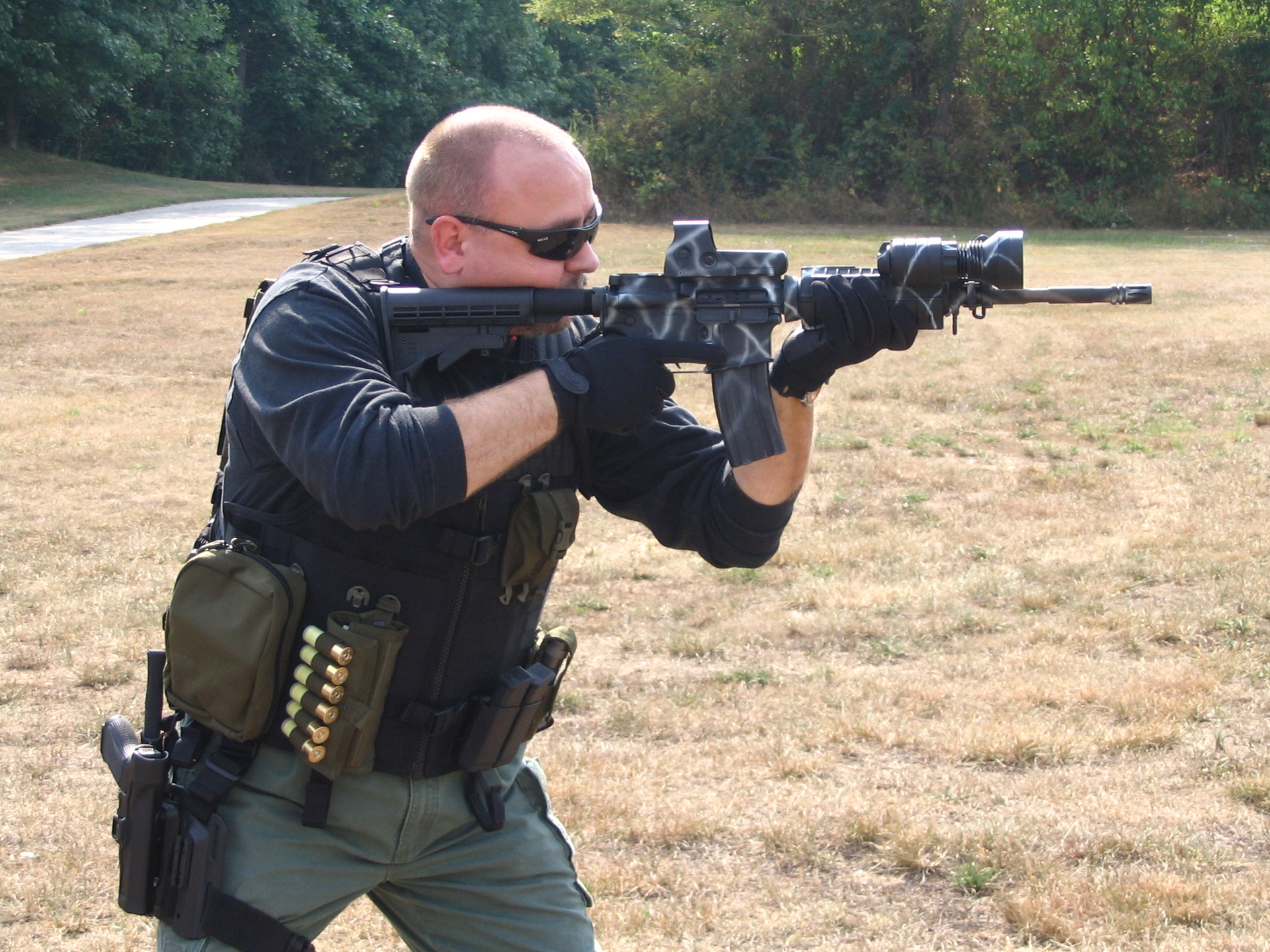 Frank Borelli firing a Rock River Arms AR-15.