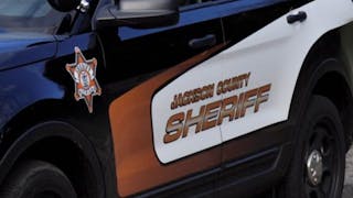 A Jackson County Sheriff&apos;s deputy responded to reports of a domestic pursuit was shot multiple times and a suspect was fatally wounded Wednesday night.