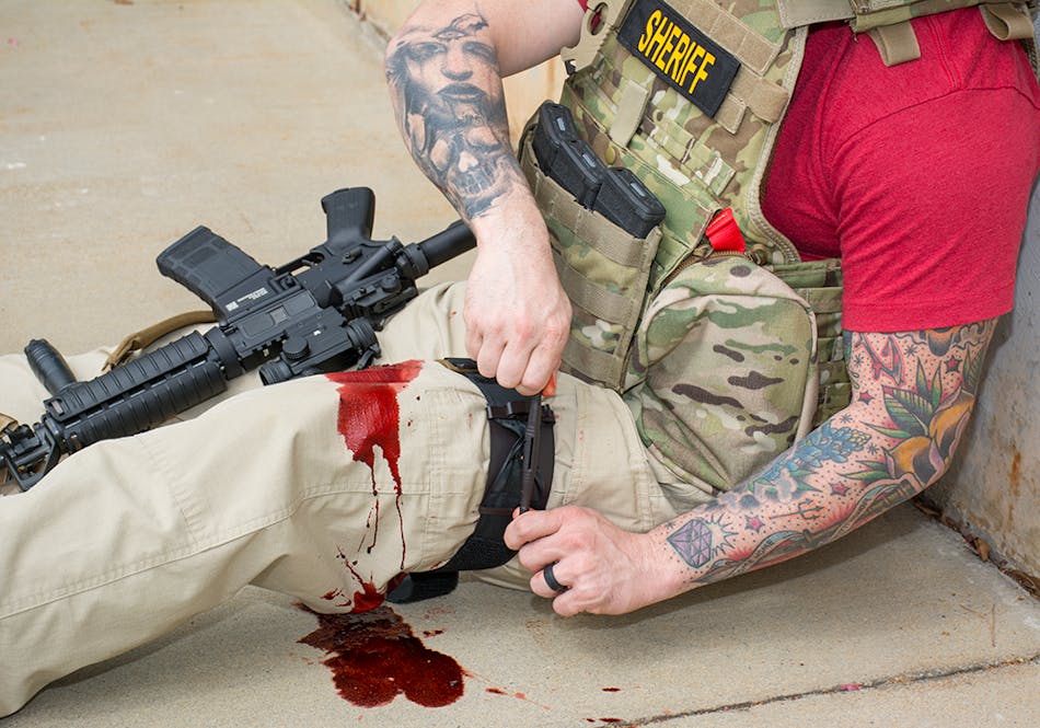 Seen here during training, taught as a self-aid and buddy-aid task, the TMT requires minimal training to instantly treat life-threatening hemorrhage of an extremity.