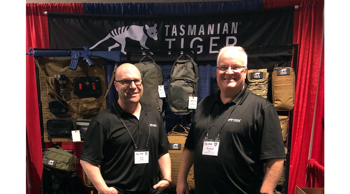 NAPED members and first-time exhibitors, Eric Linder and Richard Lewis of Tasmanian Tiger, showcase their line of law enforcement and medical response equipment.