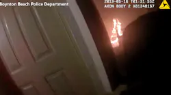 Newly released body camera video shows two Boynton Beach police officers rescue four people from a burning home Wednesday night.