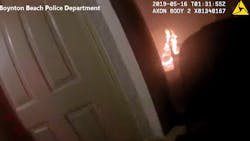 Newly released body camera video shows two Boynton Beach police officers rescue four people from a burning home Wednesday night. Newly released body camera video shows two Boynton Beach police officers rescue four people from a burning home Wednesday night.