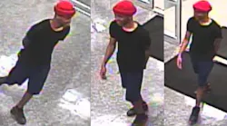 Police described the suspect as a thin man between 5'7' and 5'10' who was wearing a black T-shirt, navy blue shorts, a rolled up red skull beanie and dark high tops with red heel caps when he approached the officer.