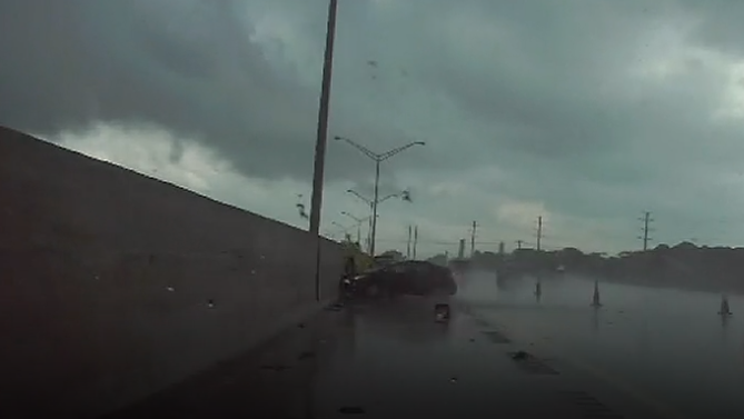 Officials say a Florida Highway Patrol trooper was lucky to only suffer a broken ankle after he was struck by a car Monday night while investigating a crash on Interstate 95.