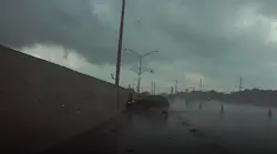 Officials say a Florida Highway Patrol trooper was lucky to only suffer a broken ankle after he was struck by a car Monday night while investigating a crash on Interstate 95.