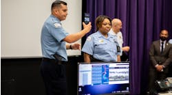 Members of the Chicago Police Department demonstrate Samsung&rsquo;s DeX In-Vehicle Solution at a press conference August 21, 2019 in Chicago.