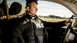 Properly fit body armor has to provide maximum coverage but also take into consideration the amount of time officers spend sitting in their patrol vehicle. Seen here is Hard Core PT overt/outer carrier from Armor Express. Properly fit body armor has to provide maximum coverage but also take into consideration the amount of time officers spend sitting in their patrol vehicle. Seen here is Hard Core PT overt/outer carrier from Armor Express.