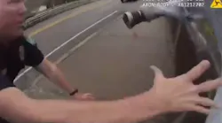 A newly released body camera footage shows a Knox County Sheriff's deputy and a Knoxville police officer save the life of a young man attempting to take his own life earlier this year.