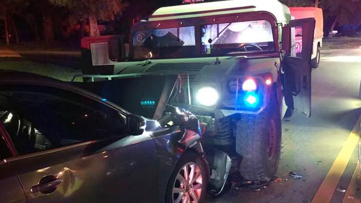 A drunk driver slammed head-on into a St. Lucie County Sheriff's deputy patroling in a high-water humvee early Tuesday morning.