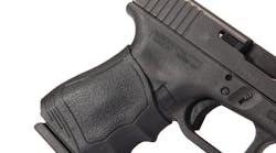 Pachmayr Gripper Sliipon Grip Black On Handgun Closeup Pachmayr Gripper Sliipon Grip Black On Handgun Closeup