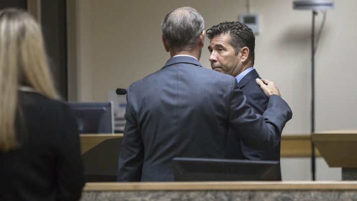 PBSO deputy Jerald Alderman, right, talks with his attorney after a hearing in a Gun Club courtroom in West Palm Beach, Florida on October 29, 2019. Alderman was charged with three counts of aggravated assault with a firearm and a charge of using a firearm while under the influence of alcohol.