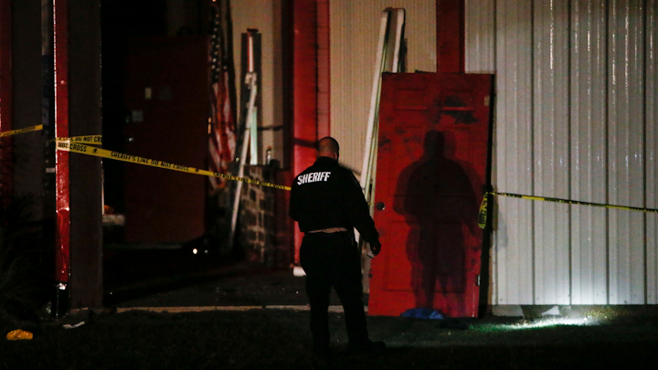 Officials work a crime scene after a shooting at Party Venue on Highway 380 in Greenville, Texas on Sunday, Oct. 27, 2019. As of early Sunday morning, a gunman remained at-large after killing at least two people and injuring 14 at Party Venue Saturday night, according to Hunt County Sheriff Randy Meeks.