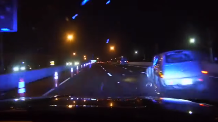 A Royal Palm Beach-area woman was charged with violating the state's 'move over' law after she sideswiped a Florida Highway Patrol cruiser in Clearwater, FHP said.