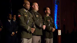 Montgomery County Police Officer Bomba, center, received the Silver Medal of Valor in 2008 at the Montgomery County Chamber of Commerce Business Awards Dinner.