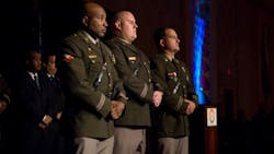 Montgomery County Police Officer Bomba, center, received the Silver Medal of Valor in 2008 at the Montgomery County Chamber of Commerce Business Awards Dinner. Montgomery County Police Officer Bomba, center, received the Silver Medal of Valor in 2008 at the Montgomery County Chamber of Commerce Business Awards Dinner.