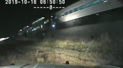 Newly released video shows a Utah Highway Patrol trooper pull an unconcious driver from a vehicle stuck on train tracks before it was struck early Wednesday morning.