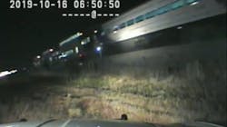 Newly released video shows a Utah Highway Patrol trooper pull an unconcious driver from a vehicle stuck on train tracks before it was struck early Wednesday morning.