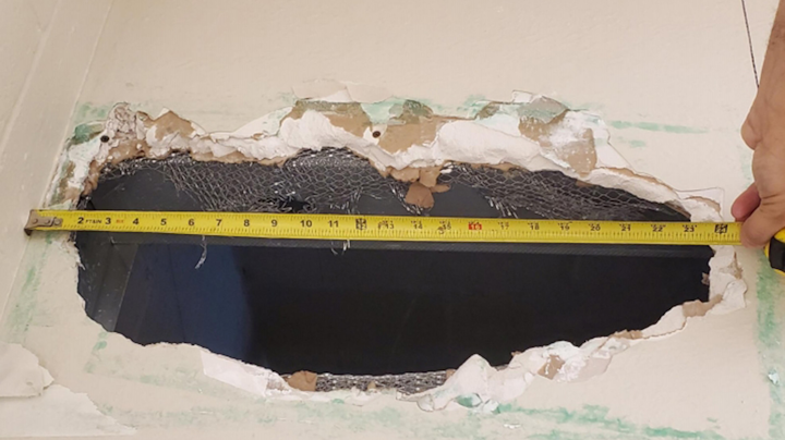 The hole the inmates cut was 22 inches long and 8 inches wide, sheriff's officials said.