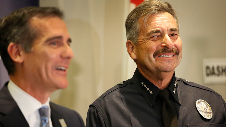 Los Angeles Police Department Chief Charlie Beck, right, and Mayor Eric Garcetti share smiles and a few tears at a news conference at LAPD headquarters on Friday, Jan. 19, 2018, as Chief Beck announces his upcoming retirement.