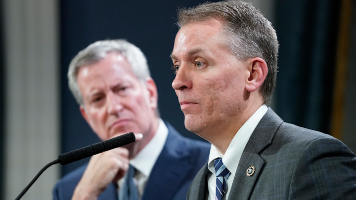 Incoming NYPD Commissioner current NYPD Chief of Detectives Dermot Shea speaks as Mayor Bill de Blasio, left, looks on Monday, Nov. 4, 2019 at City Hall in Manhattan, New York. Commissioner James O'Neill is retiring from the post.
