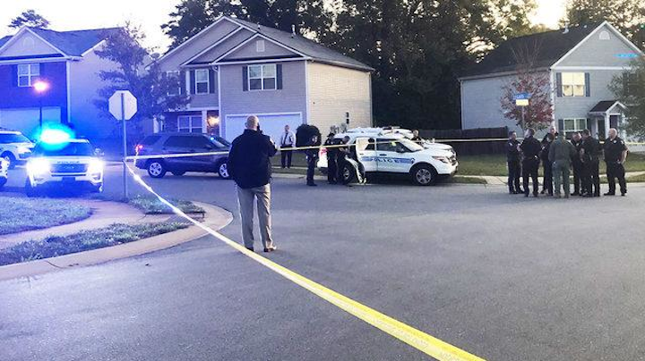 Police investigate after an officer from Gaston County was shot Friday morning in Charlotte while working with the FBI Safe Streets Task Force.