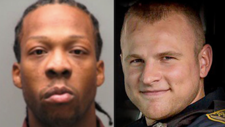 Rahmael Holt, left, and Officer Brian Shaw