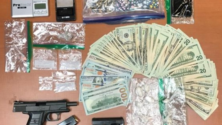 The wife of the Flowery Branch police chief was one of three people arrested last week when narcotics agents seized about $6,500 worth of heroin and methamphetamine from a Gainesville home.