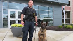 Officer Jarred Koopman, left, with K-9 Harlej Officer Jarred Koopman, left, with K-9 Harlej