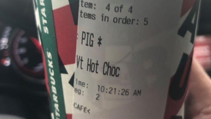 Starbucks is apologizing after a Kiefer police officer said he received his drinks with the word 'PIG' written on the cups.