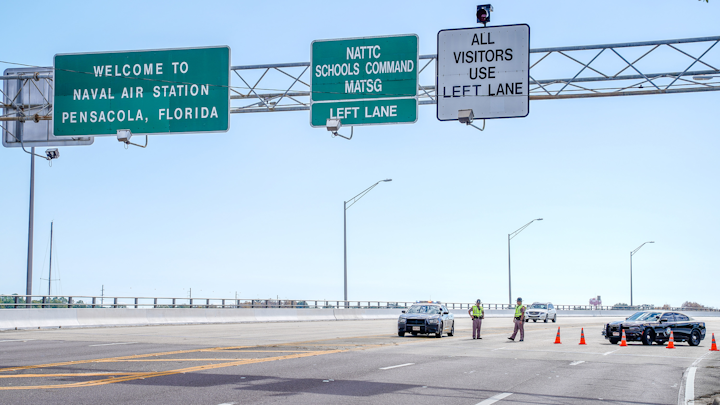 Florida State Troopers block traffic over the Bayou Grande Bridge leading to the Pensacola Naval Air Station following a shooting on December 06, 2019 in Pensacola, Florida.The second shooting on a U.S. Naval Base in a week has left three dead plus the suspect and seven people wounded.